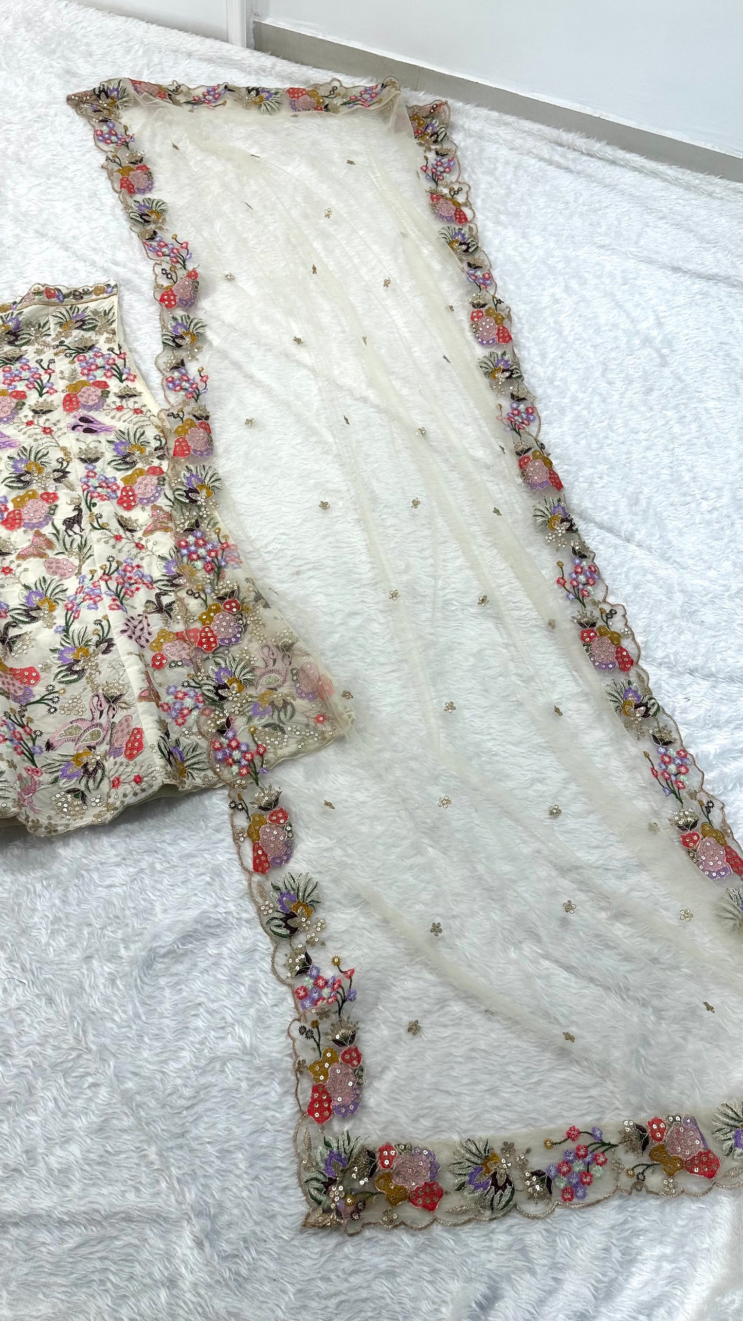 Multicolor Floral Embroidered Faux Georgette Lehenga Choli With Net Dupatta